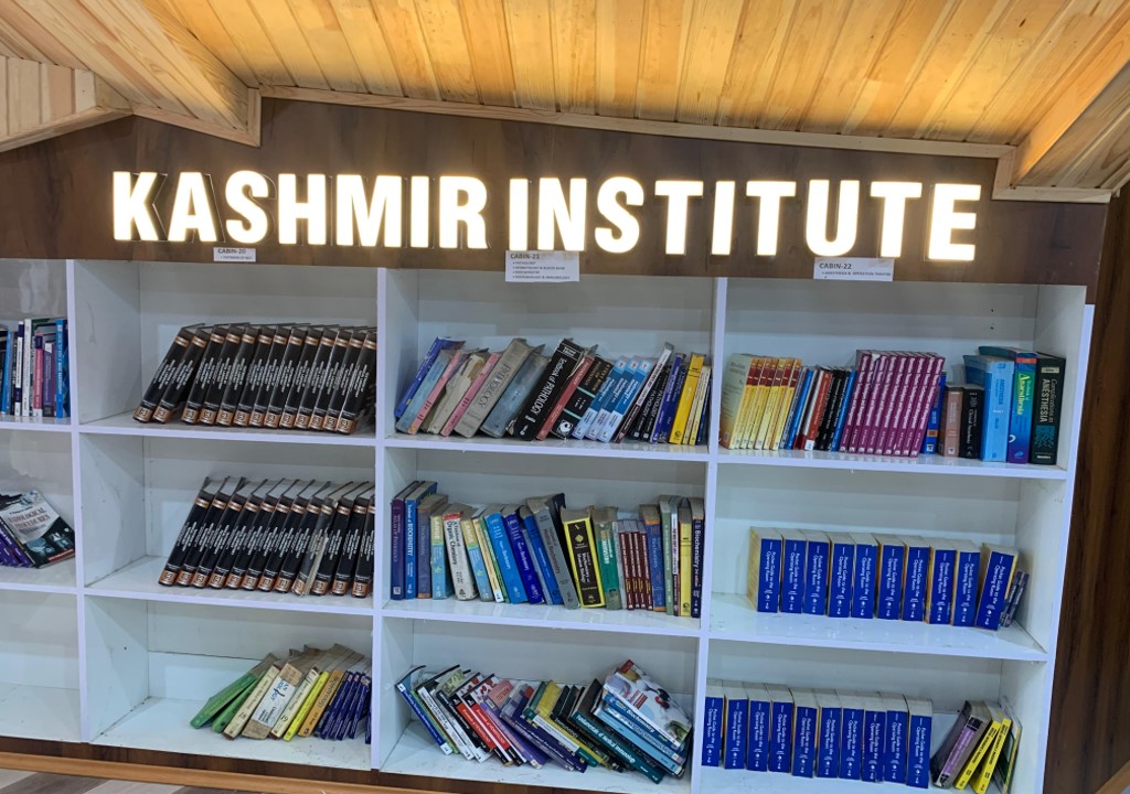 The KIMST library with shelves of medical books and journals